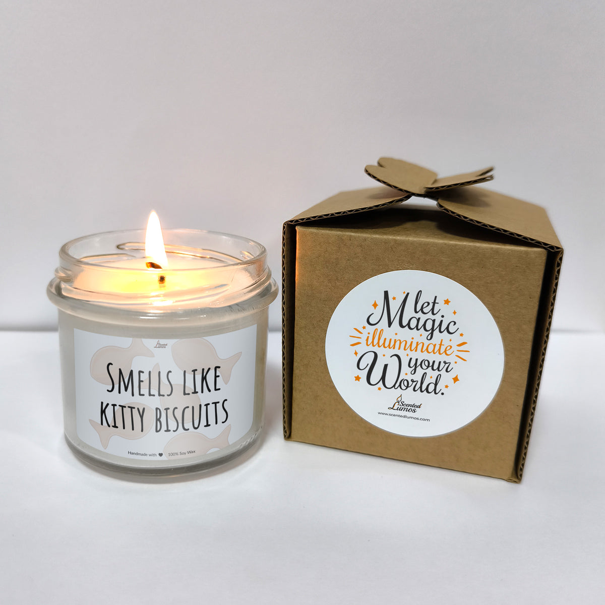 a candle that is sitting next to a box