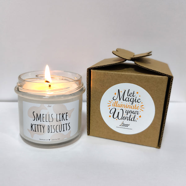 a candle that is sitting next to a box