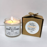 a candle that is sitting next to a box