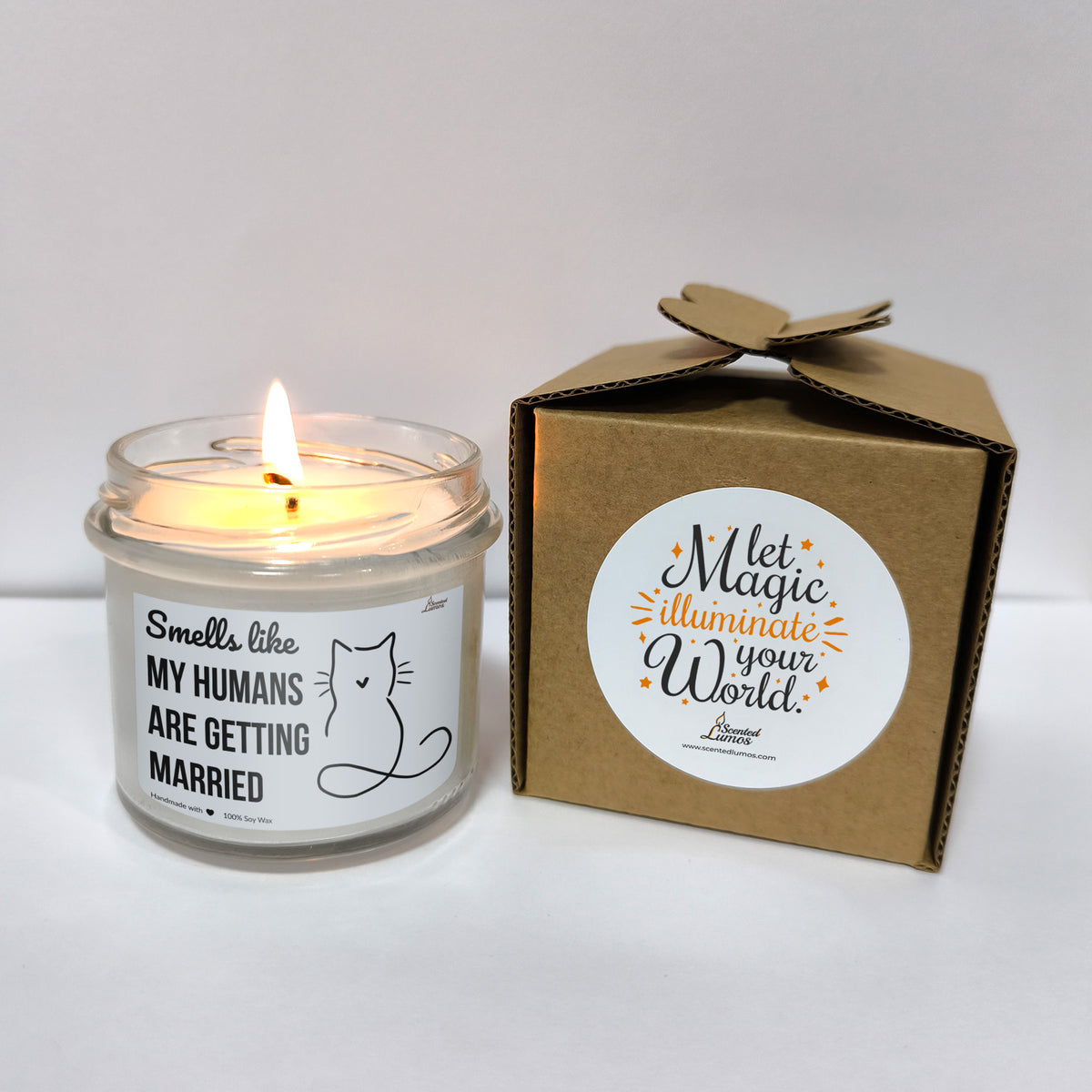 a candle that is sitting next to a box