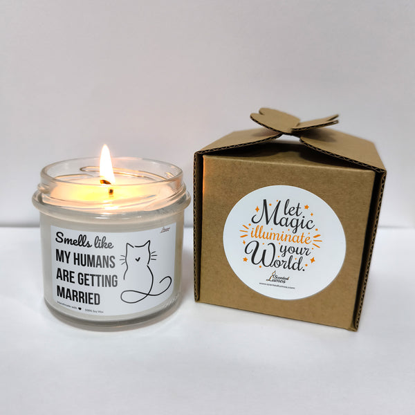 a candle that is sitting next to a box
