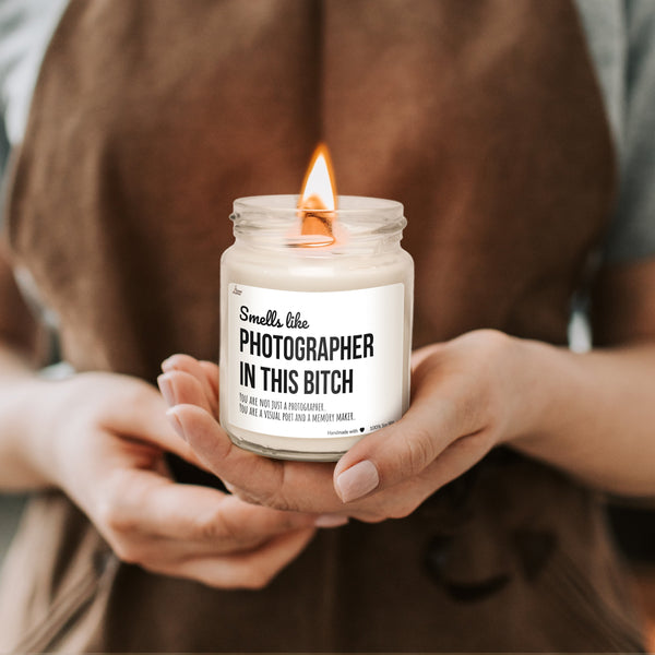 a person holding a candle in their hands