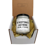 a candle in a gift box that says, vet receptionists last nerve