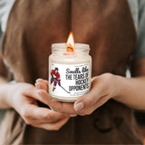 a person holding a candle in their hands