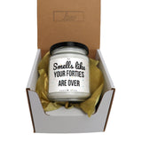 a small jar of candles in a box