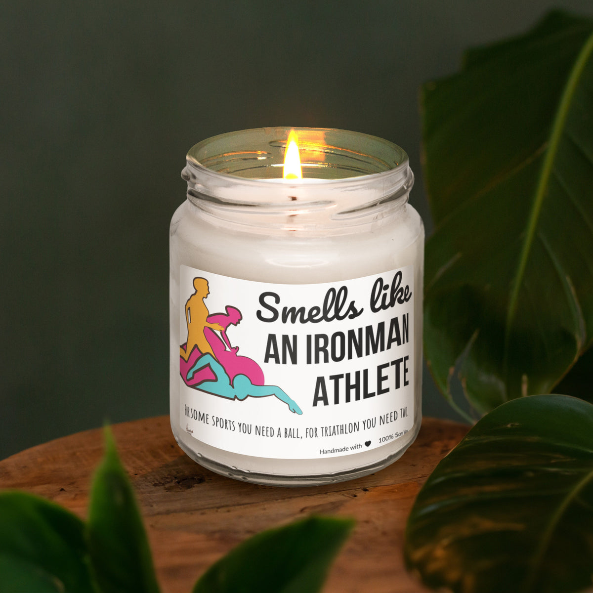 a candle sitting on top of a wooden table