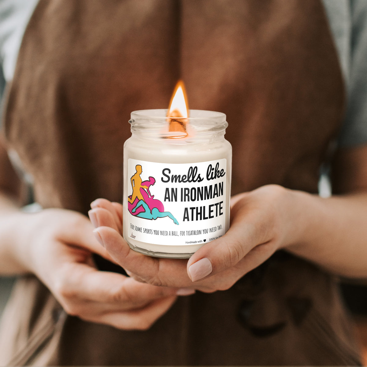 a woman holding a candle in her hands