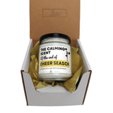 a jar of cheer season sits in a box
