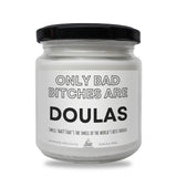 a white jar with a black lid that says, only bad bitches are douglas