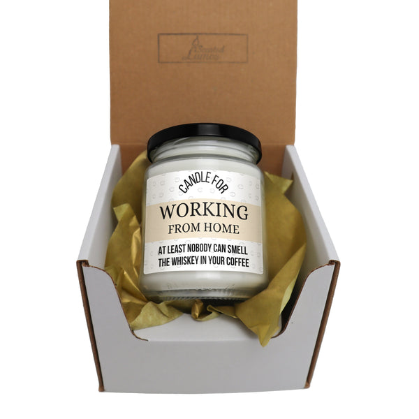 a jar of work from home candle in a box