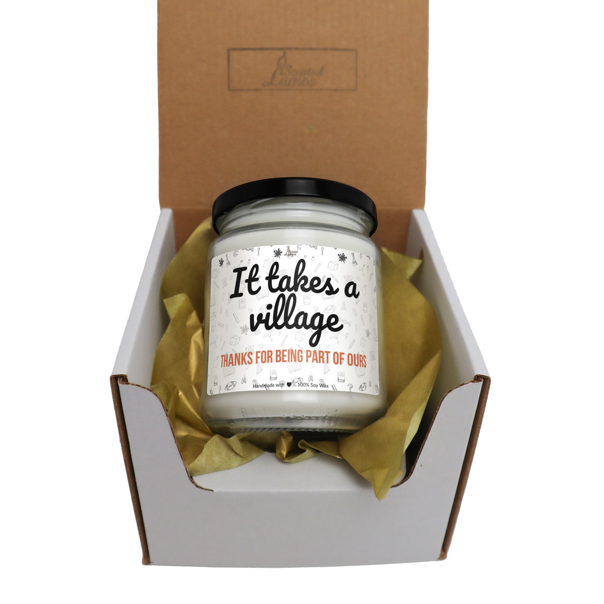 it takes a village candle in a gift box