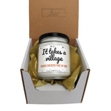 it takes a village candle in a gift box