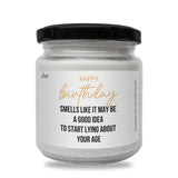 a jar of birthday candles on a white background
