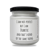 a white jar with a black lid that says i am not perfect but i am