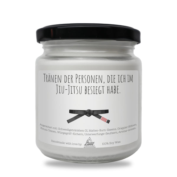 a jar of white wax with a black lid