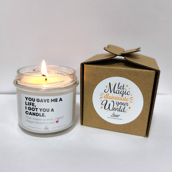 a candle that is next to a box