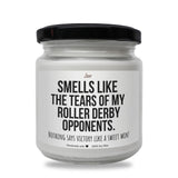 a white jar with a black lid that says smells like the tears of my roller