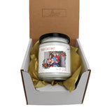 a christmas candle in a gift box