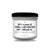 a white jar with a black lid that says, with a scent of endless self
