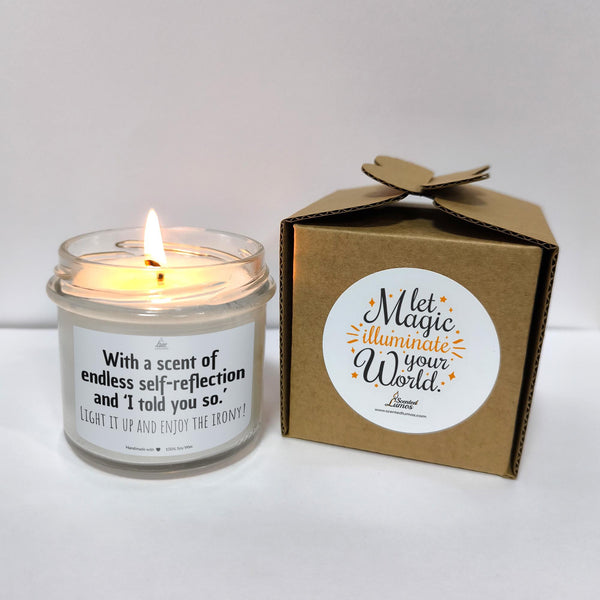 a candle that is next to a box