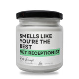 a white jar with a black lid that says smells like you're the best
