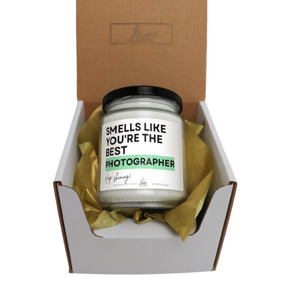 a jar of photography sits inside of a box