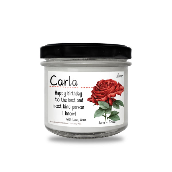 a jar of candles with a red rose on it