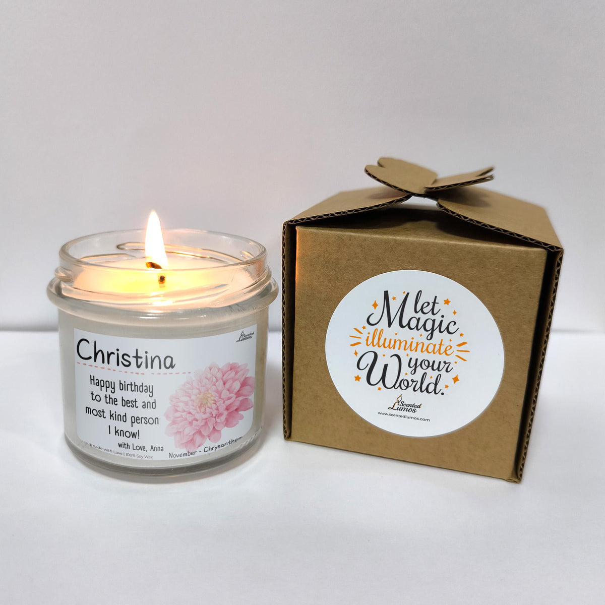 a candle sitting next to a box of candles
