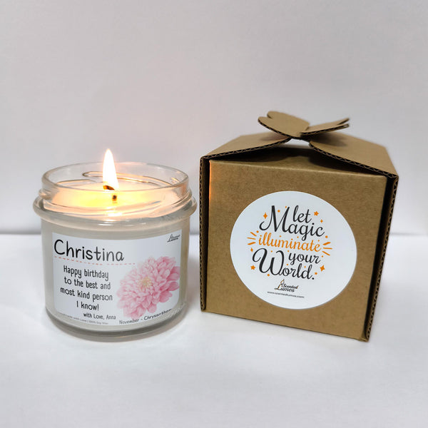 a candle sitting next to a box of candles