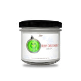 a glass jar with a green christmas ornament on it