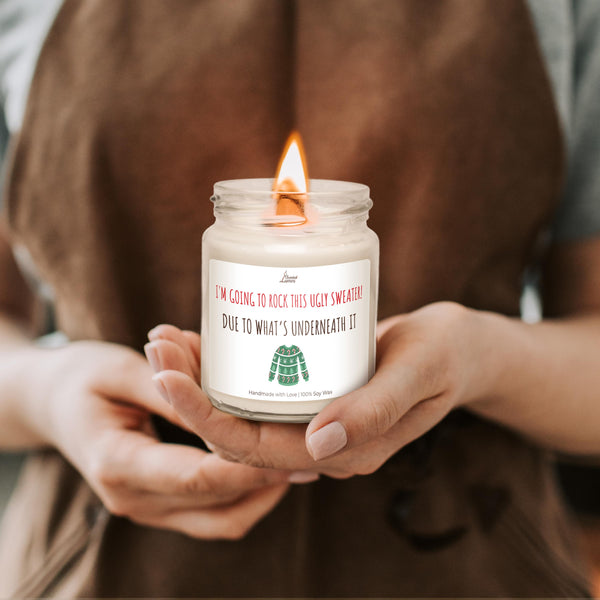 a person holding a candle in their hands