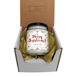 a christmas candle in a gift box