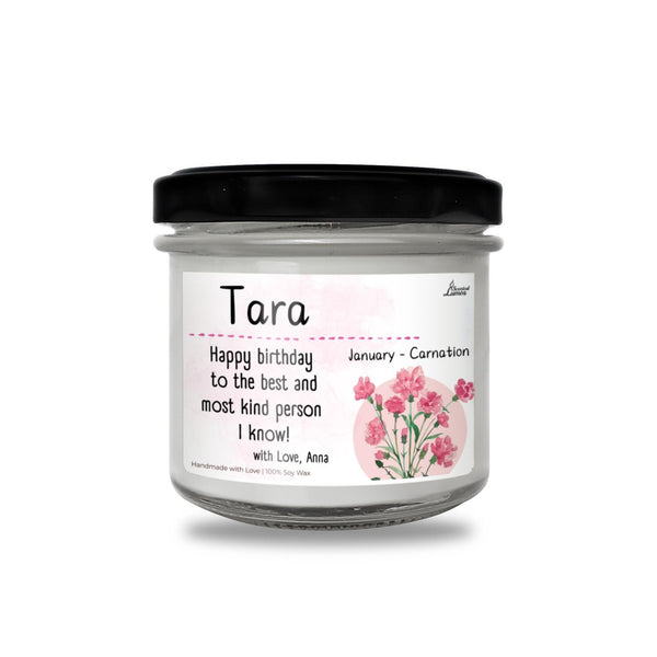 a jar of happy birthday candles with pink flowers