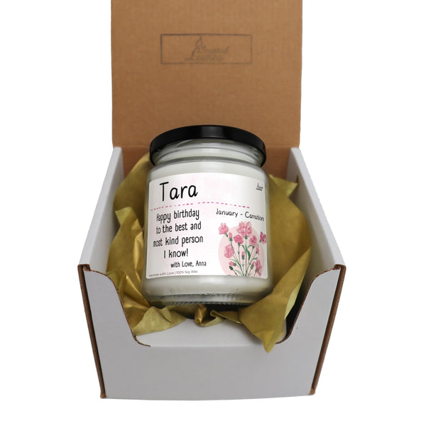 a jar of tea sits inside of a box