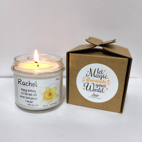 a candle is sitting next to a box