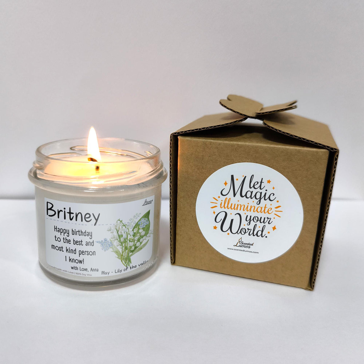 a candle that is next to a box