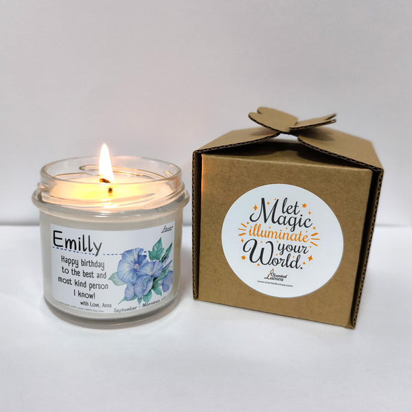 a candle sitting next to a cardboard box