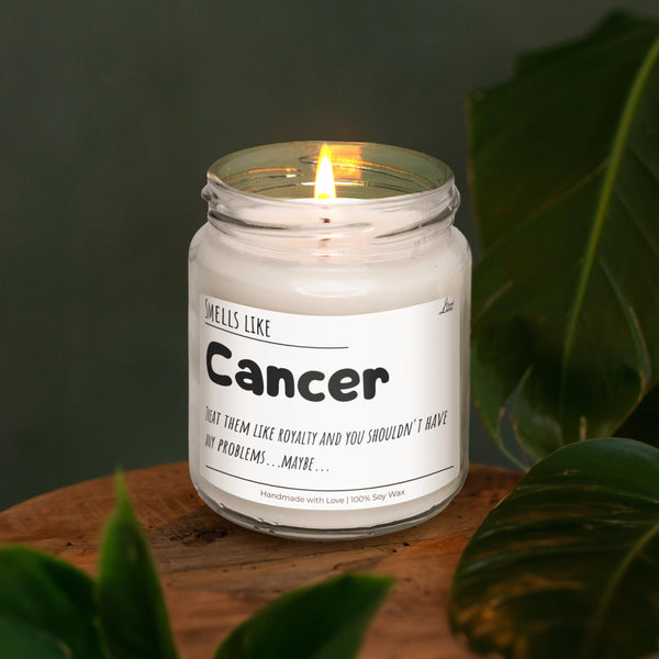 a candle sitting on top of a wooden table