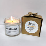 a candle sitting next to a cardboard box