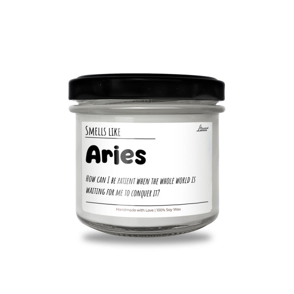 a jar of white candles with a black lid