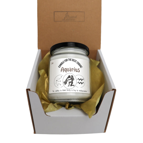 an open box with a candle inside of it