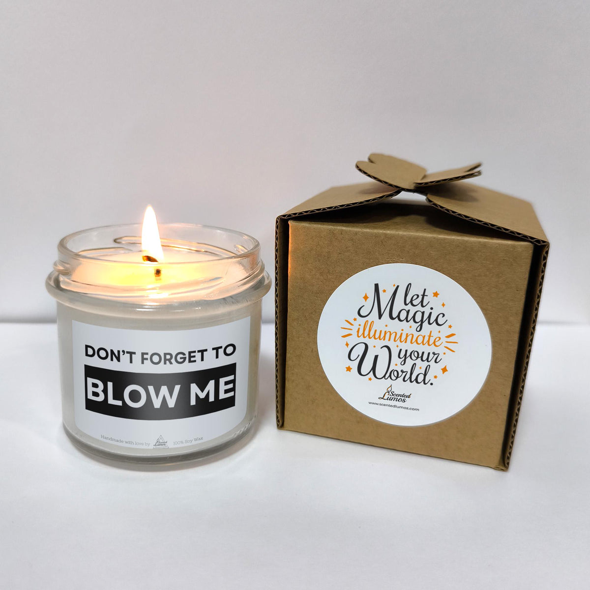 a candle that is next to a box