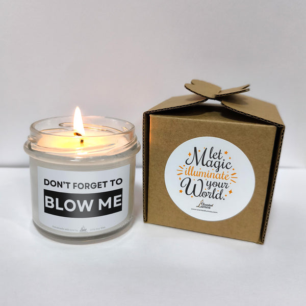 a candle that is next to a box